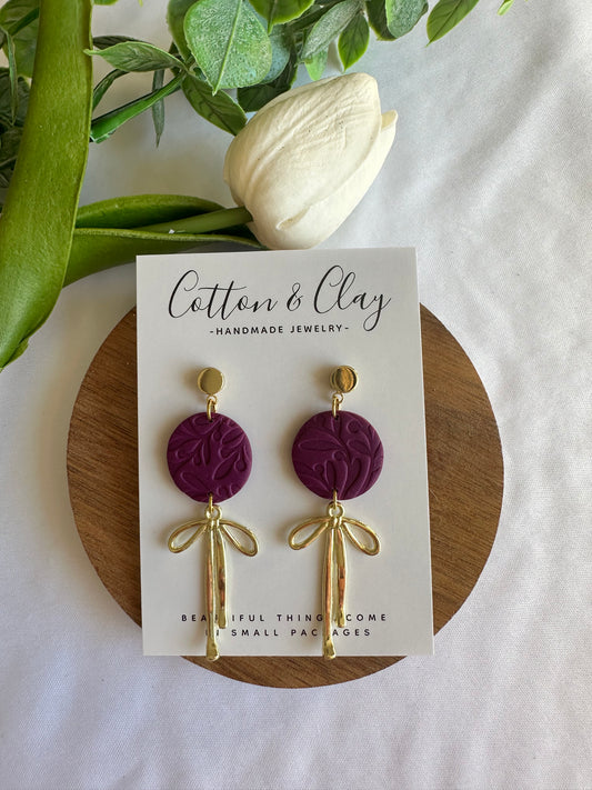 Purple with dangle bow