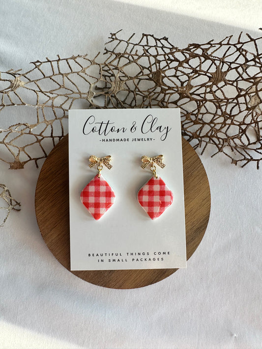 Red check with bow